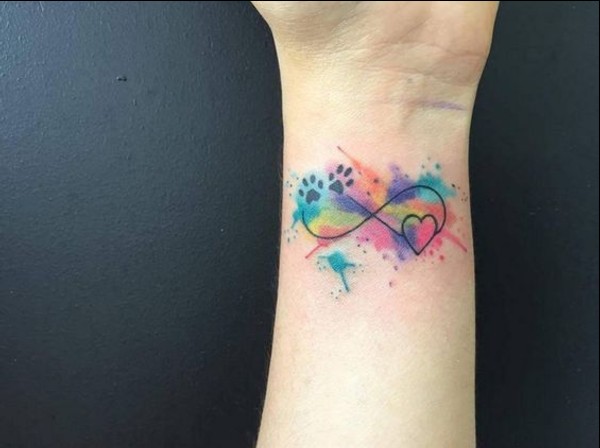 heart and paw with infinity tattoo on wrist