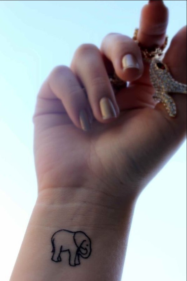 small elephant wrist tattoos 