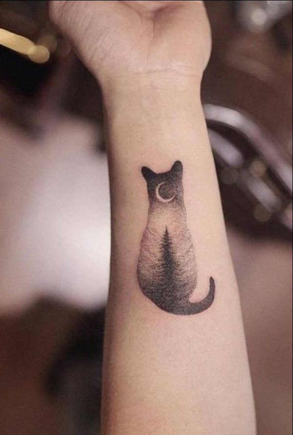 cat moon and tree wrist tattoos