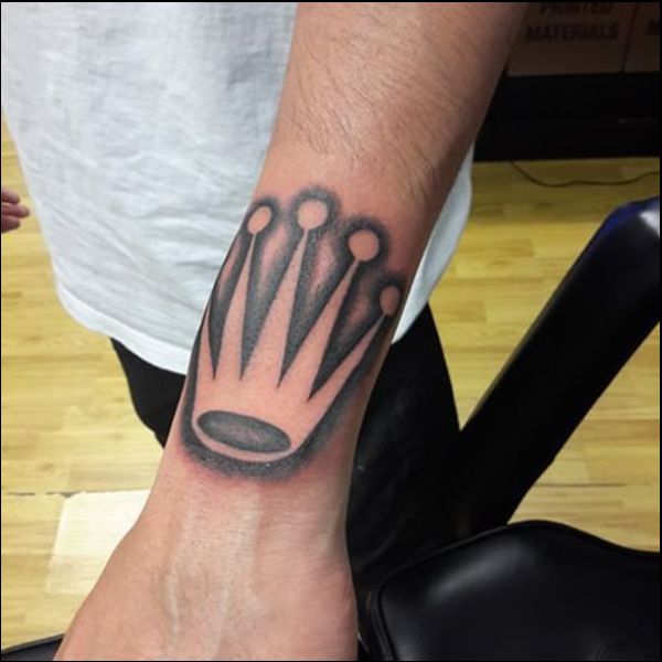 rolex on wrist tattoo