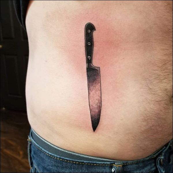 tribal chef knife tattoo