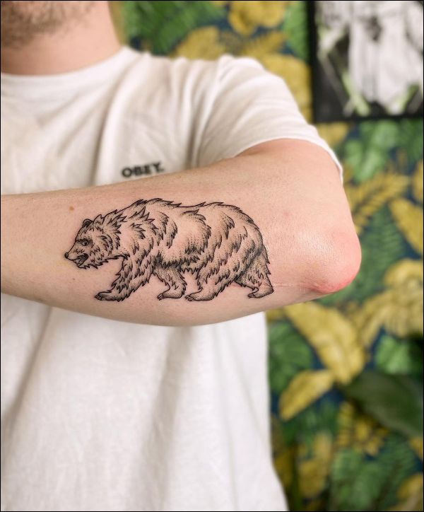 bear on forearm tattoo designs