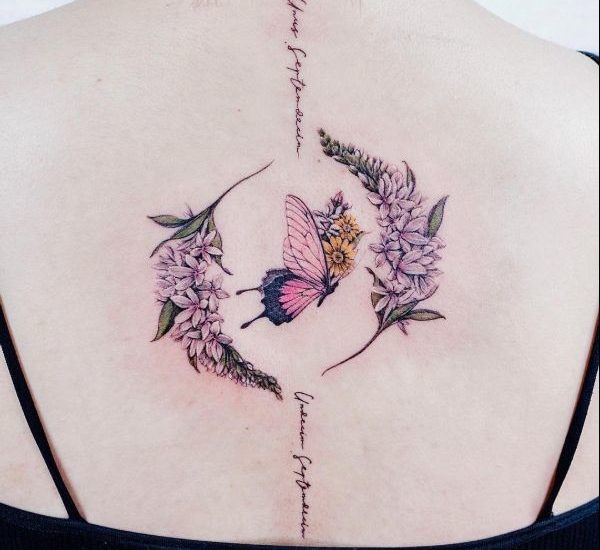 floral butterfly tattoo with quotes on back