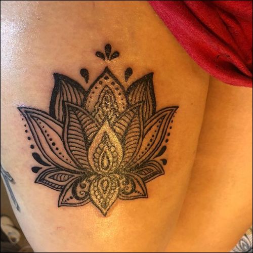 Lotus mandala tattoo design on thigh