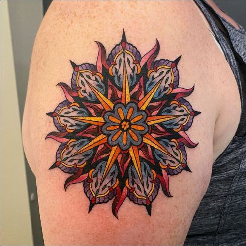 Colorful mandala tattoo on shoulder