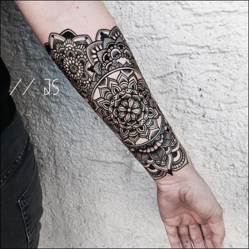 Awesome lotus mandala tattoo on inner forearm
