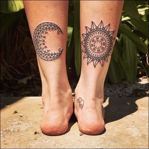 sun and moon lotus tattoo on calf with small elephant on ankle
