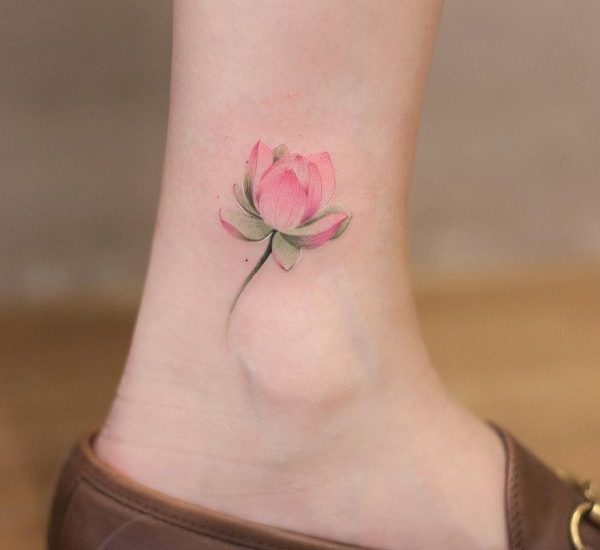 unique lotus tattoo on ankel