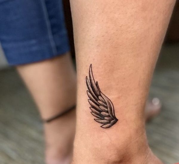 Angel wing tattoo on ankle