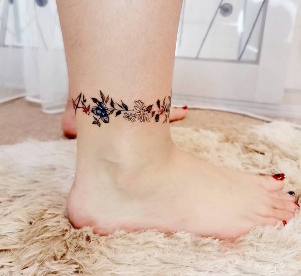 floral anklet tattoo