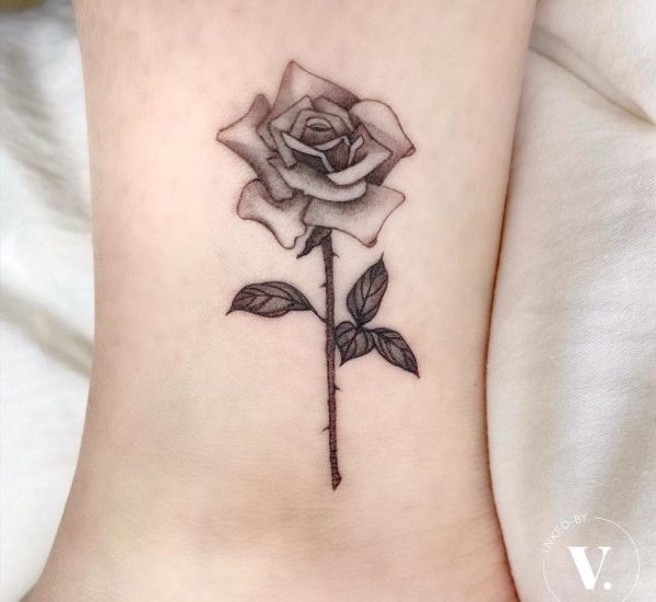 pretty dark red rose tattoo on ankle