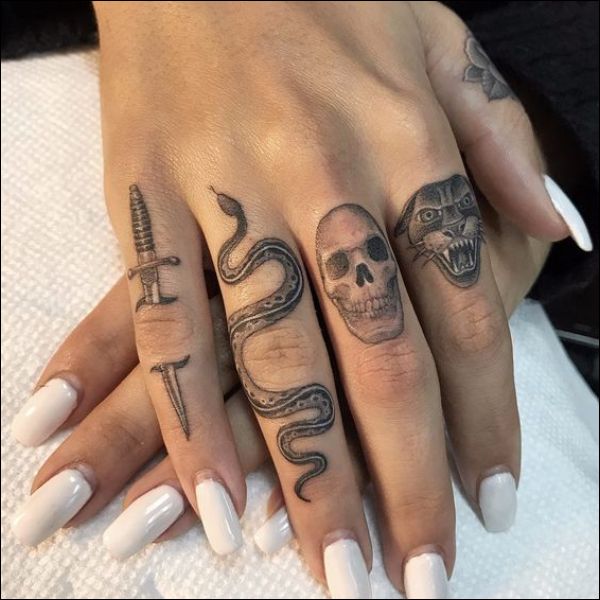 snake finger tattoo