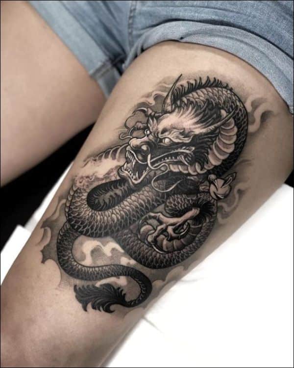 dragon tattoo designs on thigh