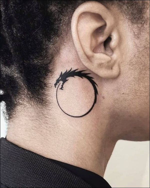 small dragon tattoo design behind the ear