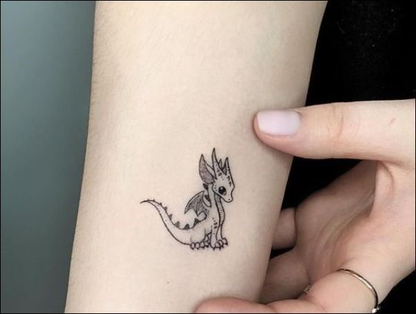 cute small dragon tattoo design on forearm