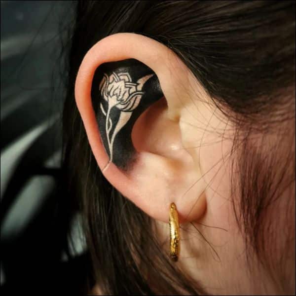 lotus flower ear tattoos