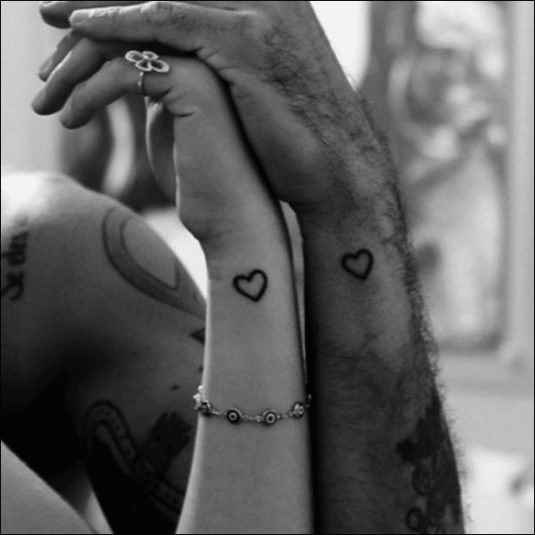 couple heart tattoos