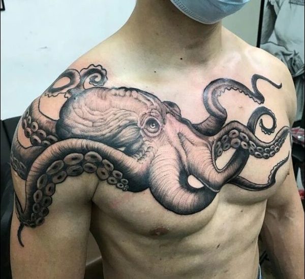 large octopus tattoo on chest