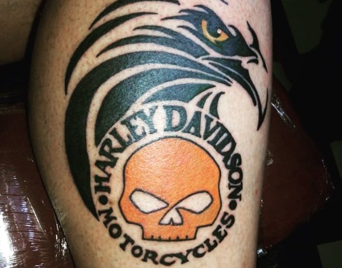 Tribal Eagle, skull, and Harley Davidson tattoo