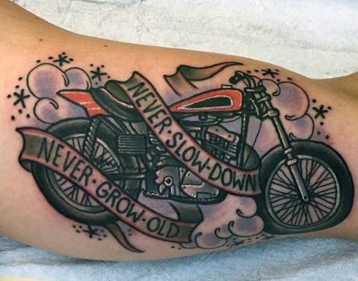 Never Slow Down- Never Grow Old" Harley Davidson motorcycle tattoo