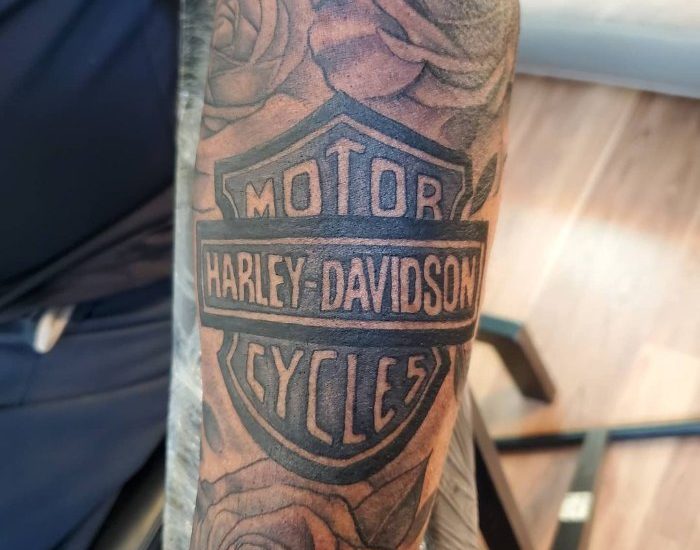 Harley Davidson with rose tattoos