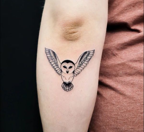 owl tattoo design on forearm
