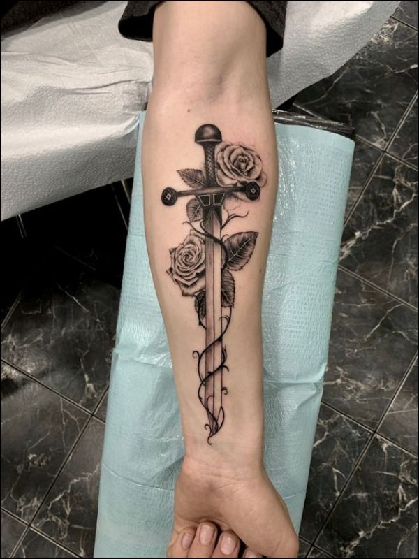 Tattoo uploaded by Ricardo Mesa  Crown sword roman numerals  Tattoodo