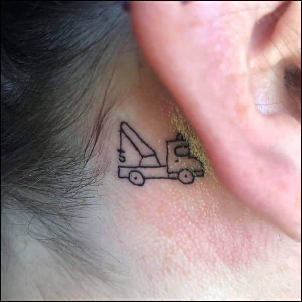 small tow truck tattoos behind the ear