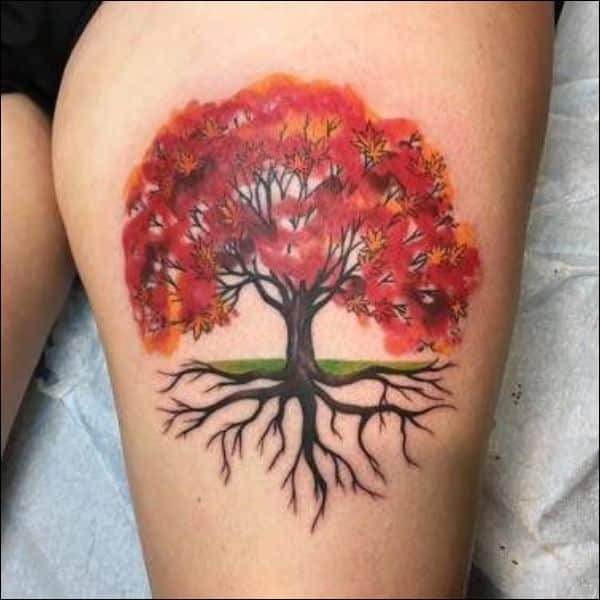 tree of life on thigh tattoo