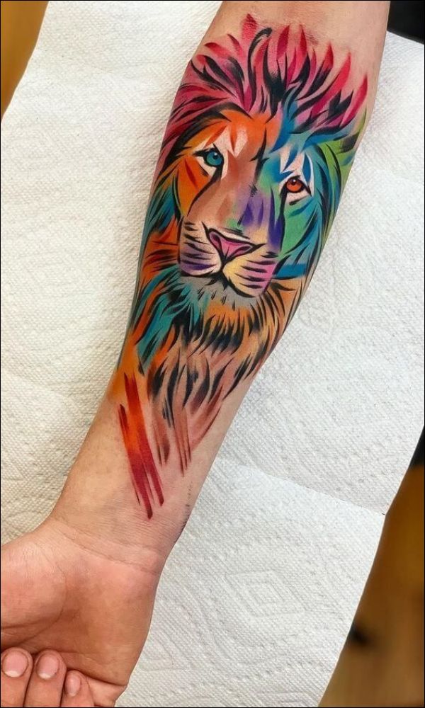 Lion watercolor tattoo designs on forearm