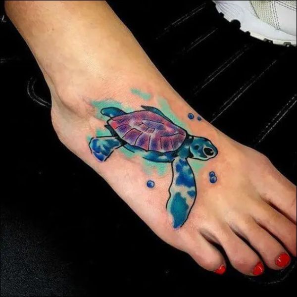 Turtle watercolor tattoo design on foot